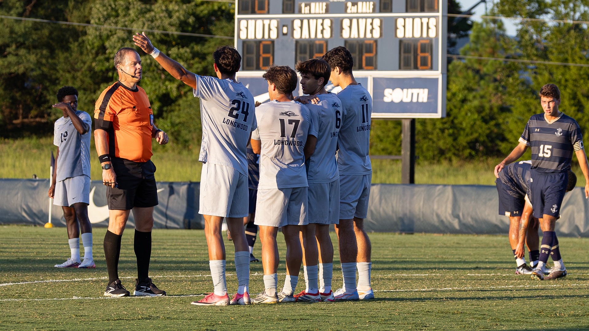 Four Lancers line up in a wall against a free kick in Longwood's match against Navy at home on Sept. 15, 2026. 