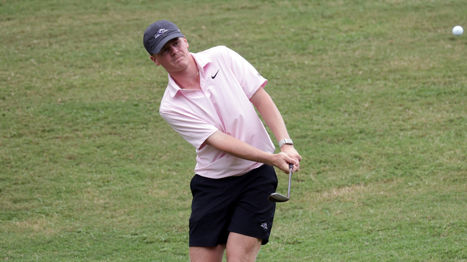 Parker Brock hits a chip shot around the green during the opening round at the Bryan National Collegiate. 