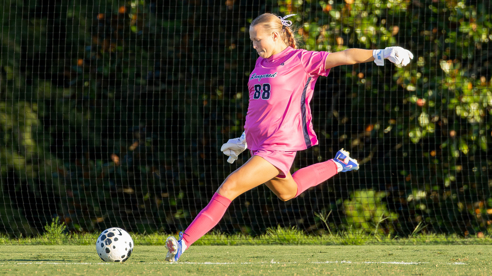 Madie Wessel punts a ball in a match against Hampton on September 6, 2026