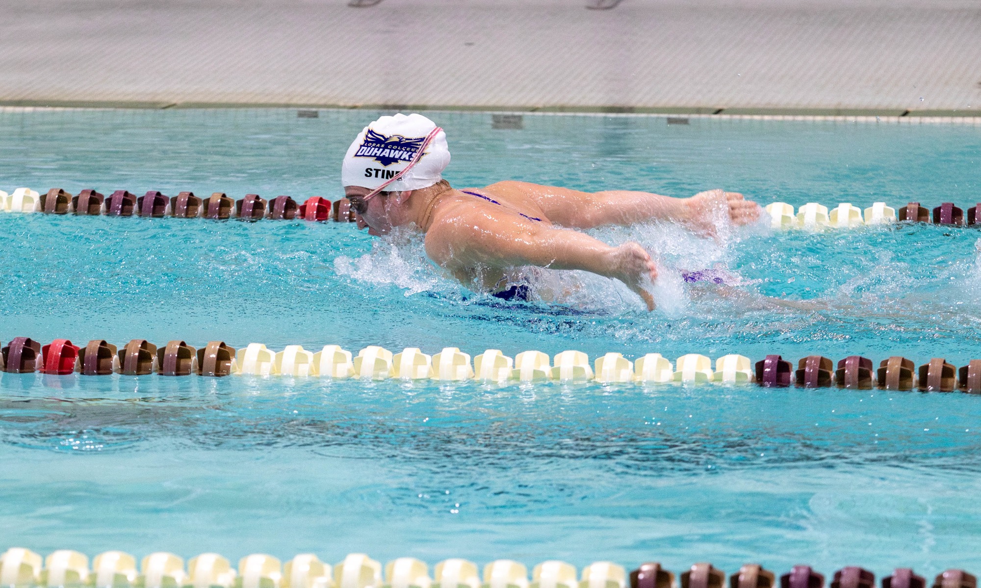 Loras's Elliana Stine executes butterfly stroke during their practice in the San Jose Pool on January 10, 2025 
