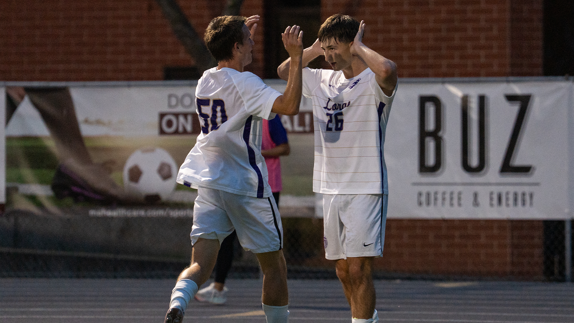 Source and Barsch Celebrate goal v. Westminster