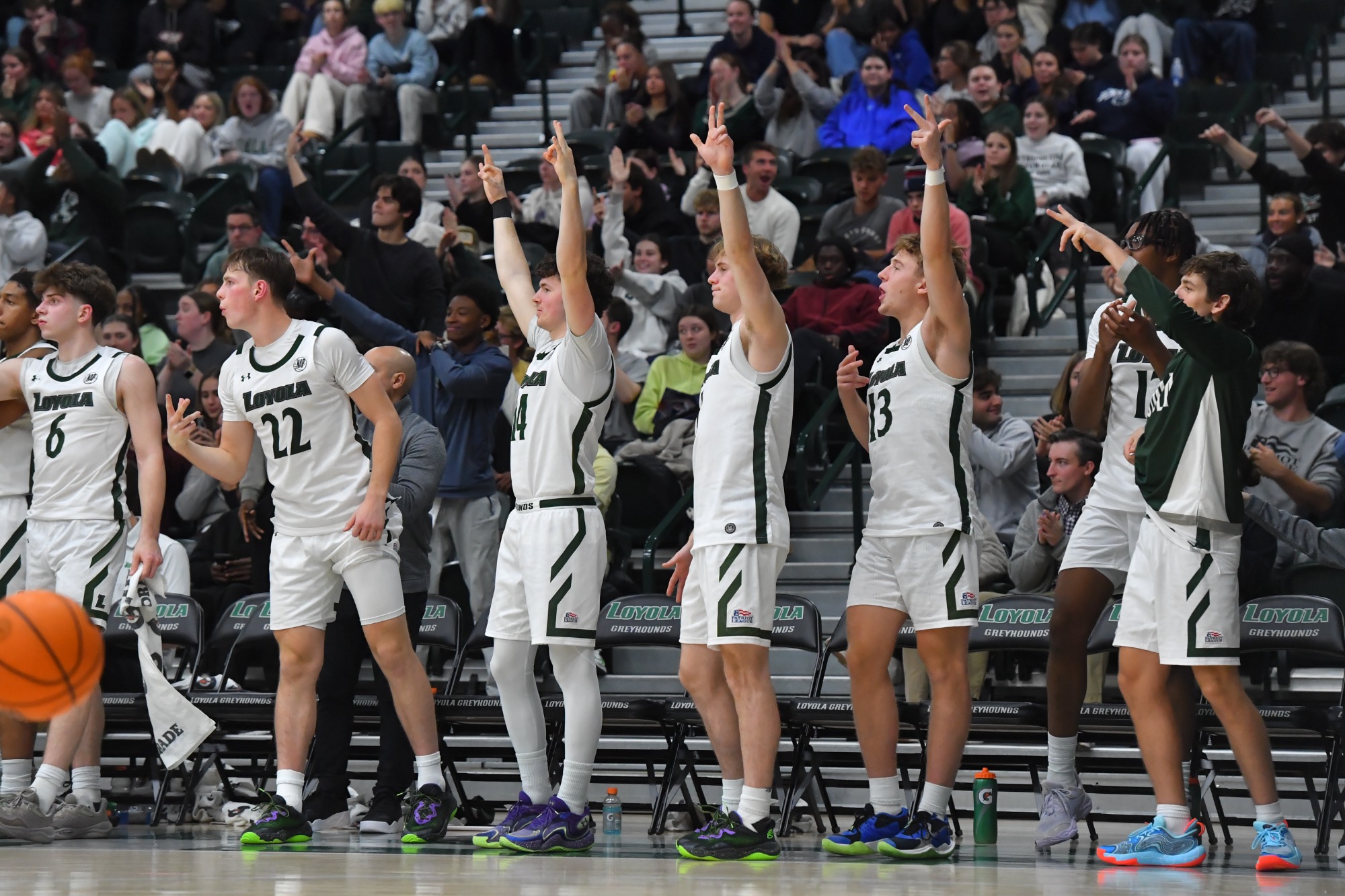 The Greyhounds celebrate a basket