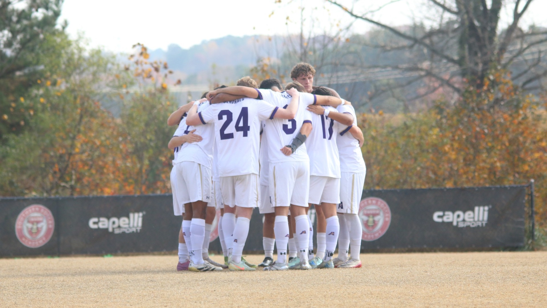 The starting XI huddle prior to kickoff against Milligan