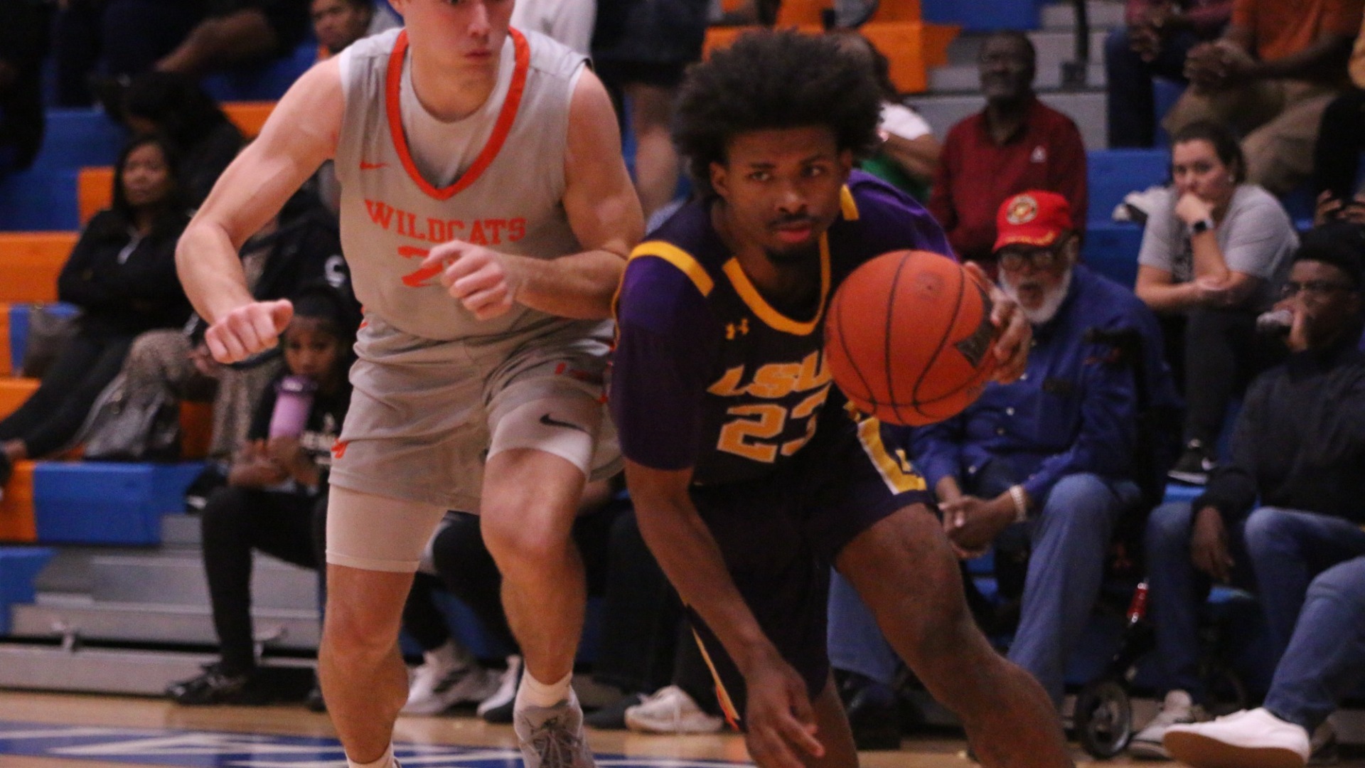 Jordan Decuir drives around a defender at LCU