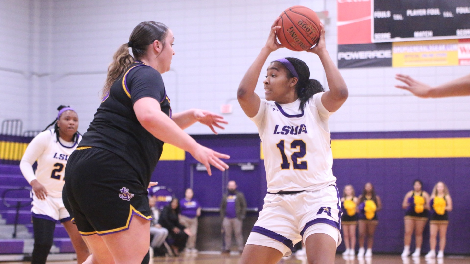 Sydney Person defends the ball against LSU Shreveport