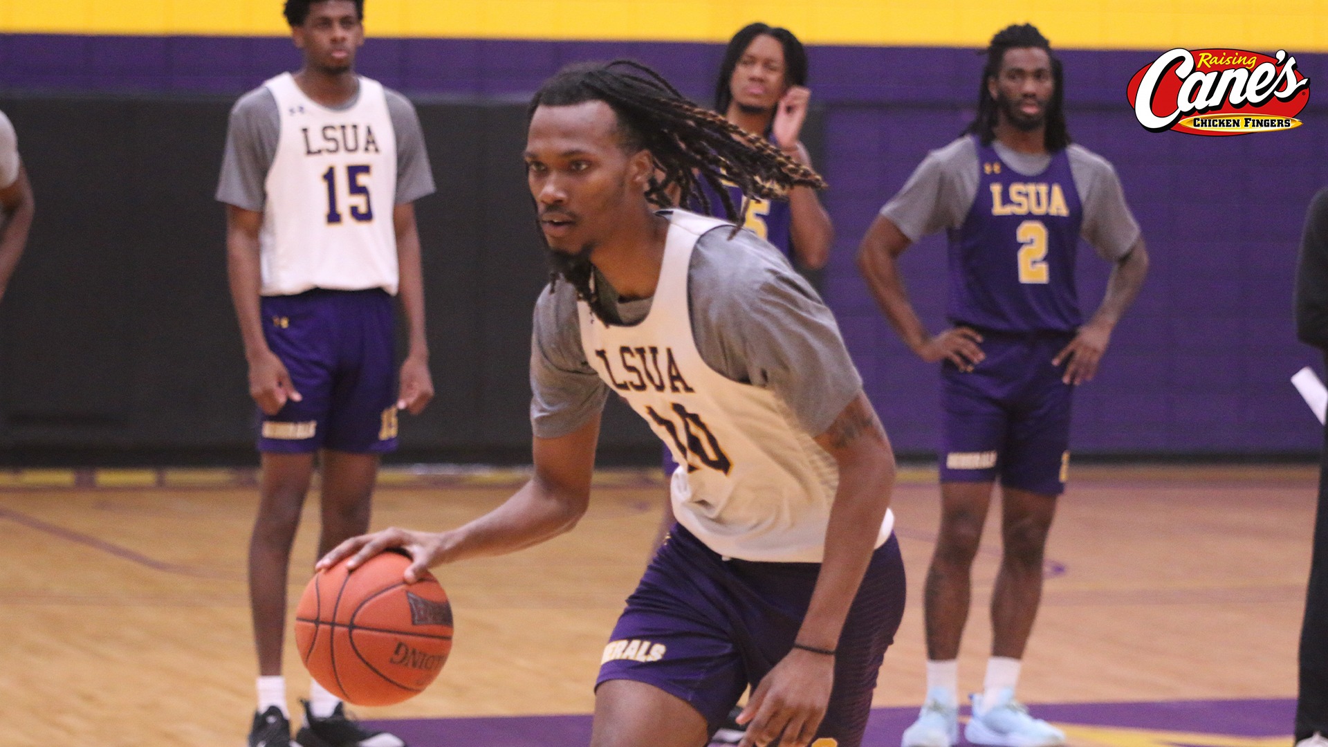 Norman Beckford dribbles during practice