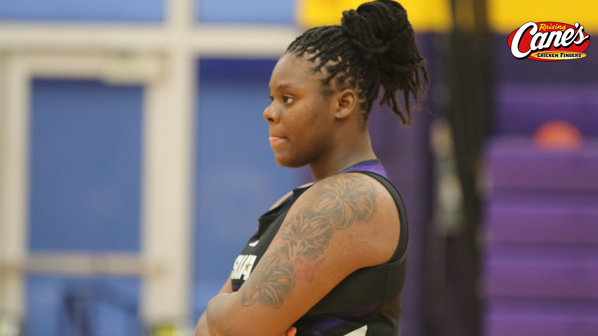 Justice Young looks on during practice