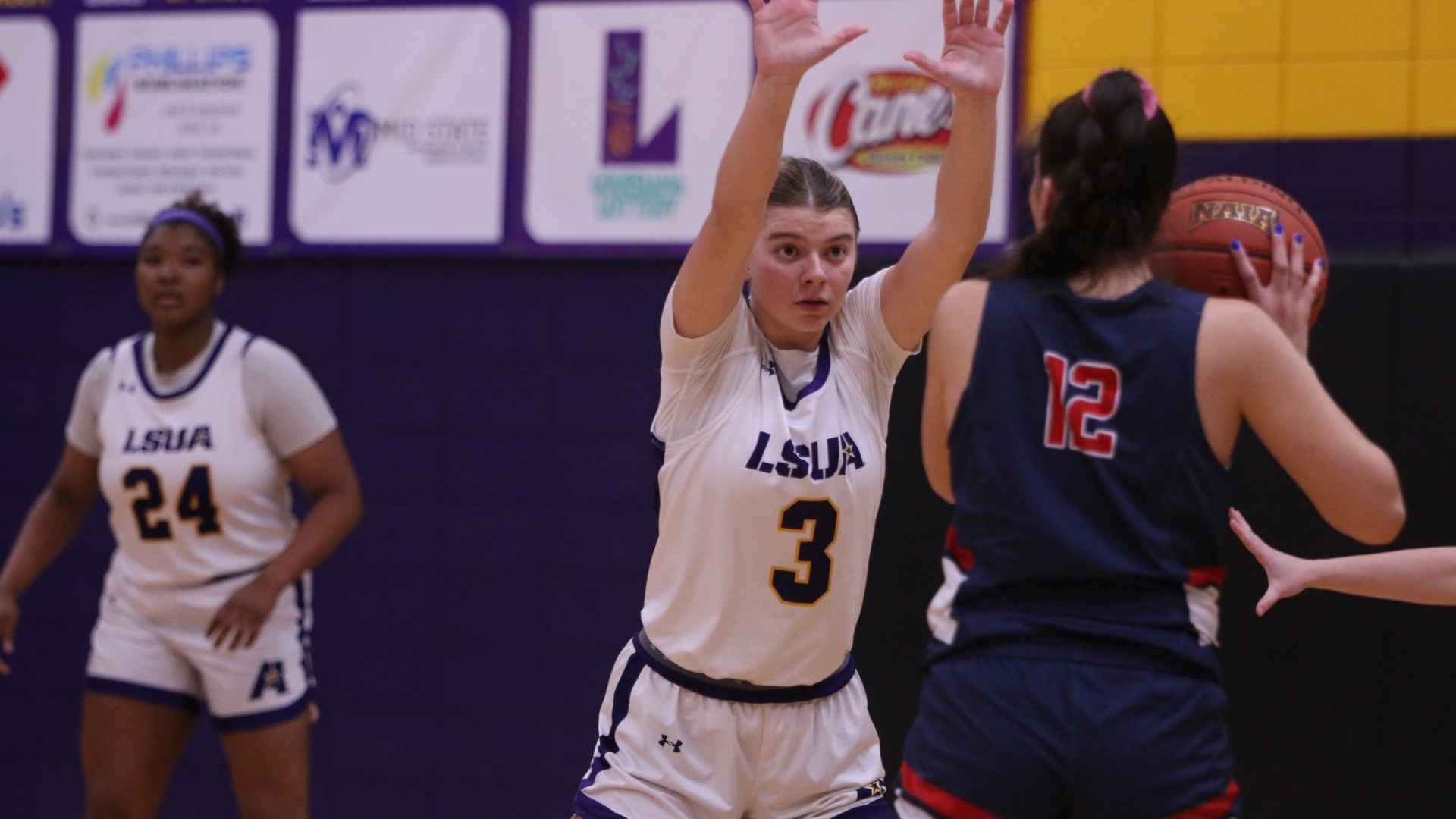 Addison Walker defends against a USW player