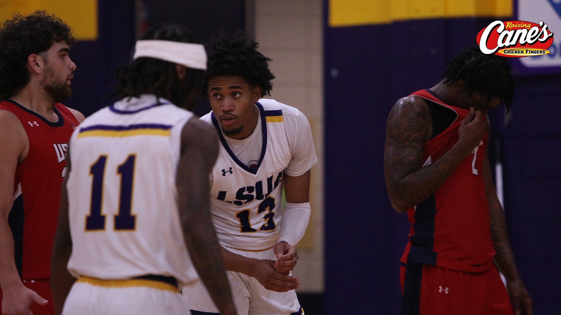 Bryce Journee leans in to talk to a teammate during a game
