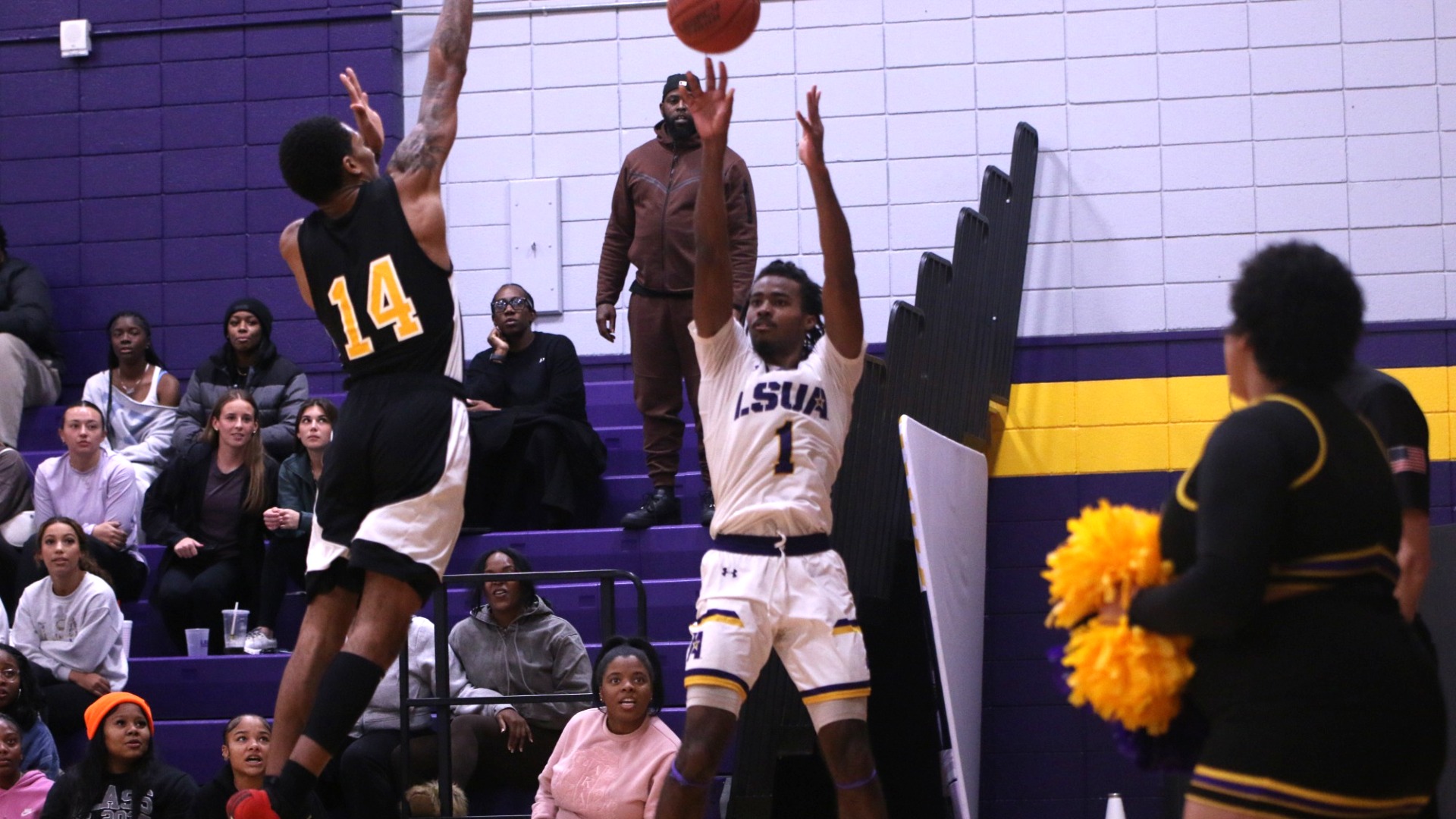 EJ McQuillan shoots a three against XULA