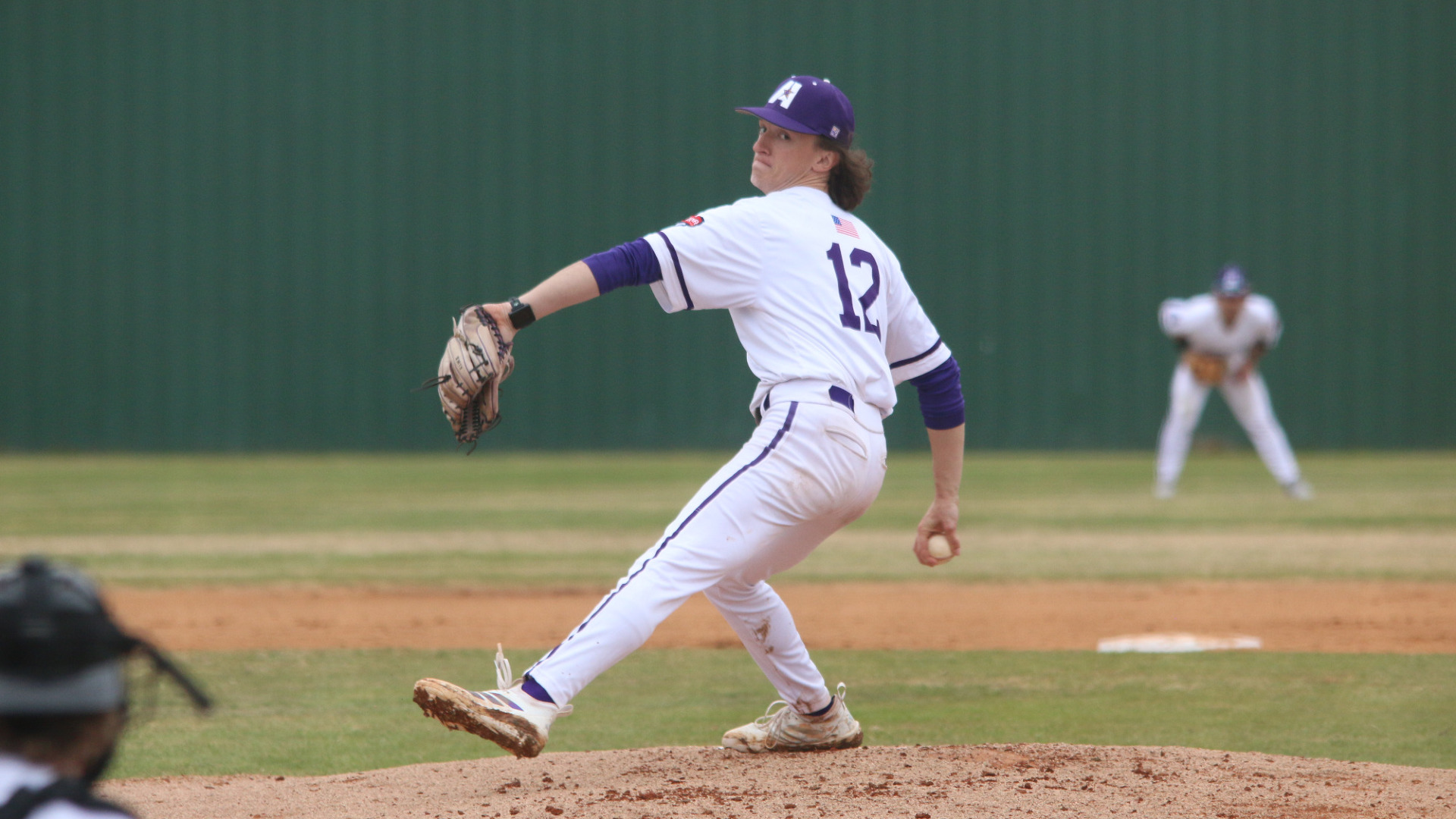 Carter Fabre delivers a pitch against Wiley
