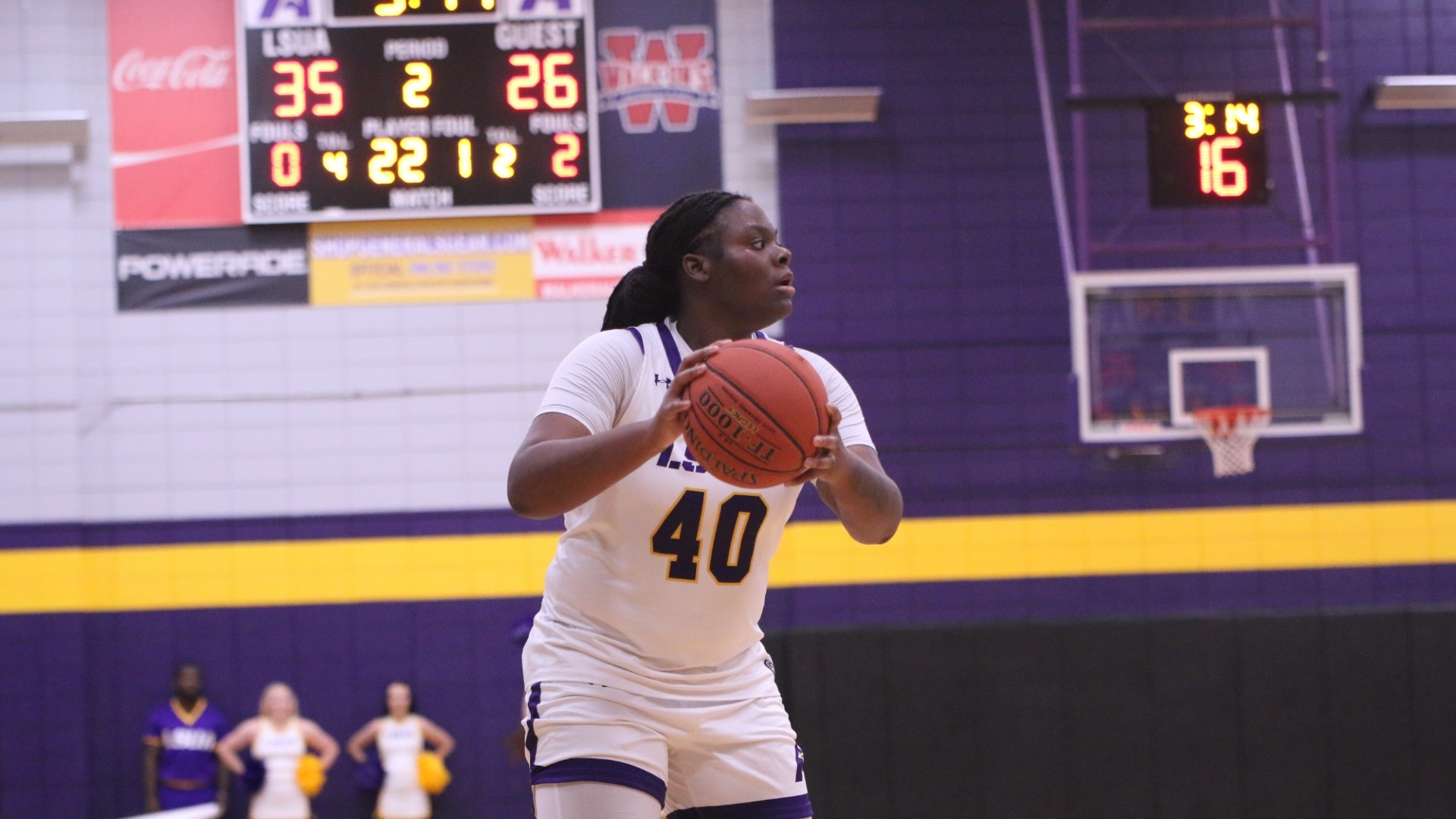 Justice Young looks for an open teammate against LCU