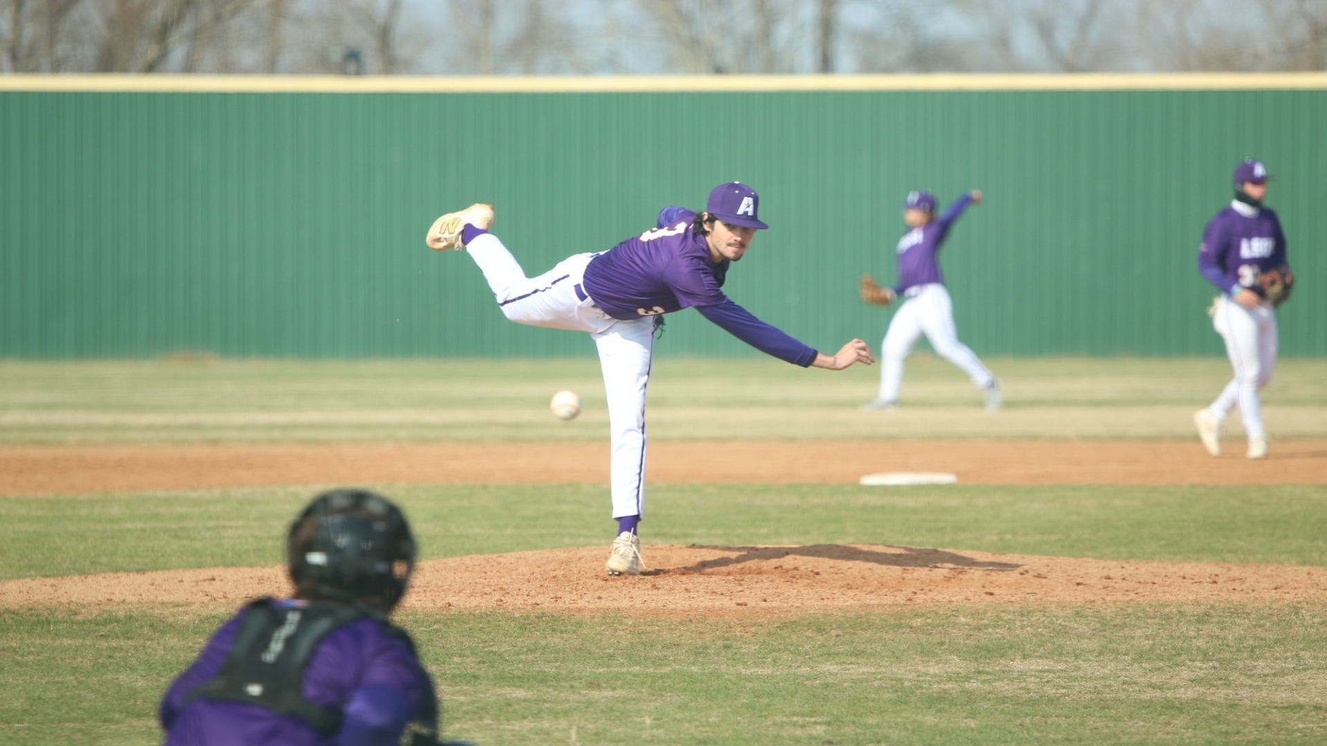 Corbyn Womack delivers a pitch in between innings during a game against John Melvin University