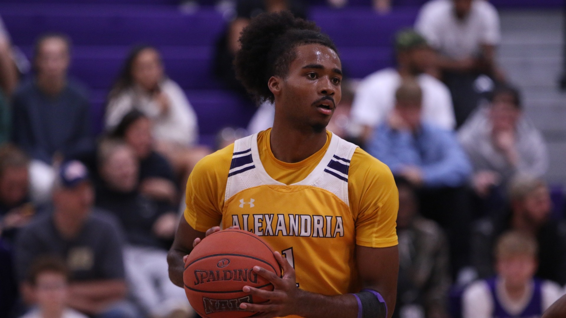 EJ McQuillan holds the ball during a game against TAMUSA