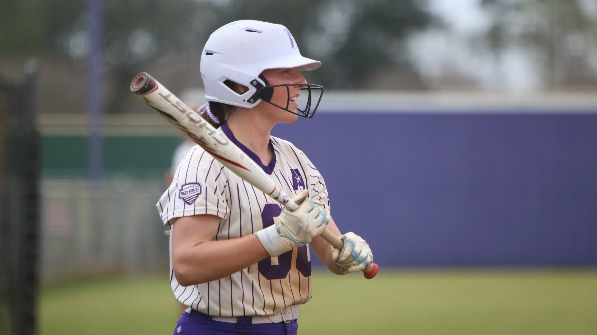 Kilee Moody stands in the on deck circle prior to her at-bat
