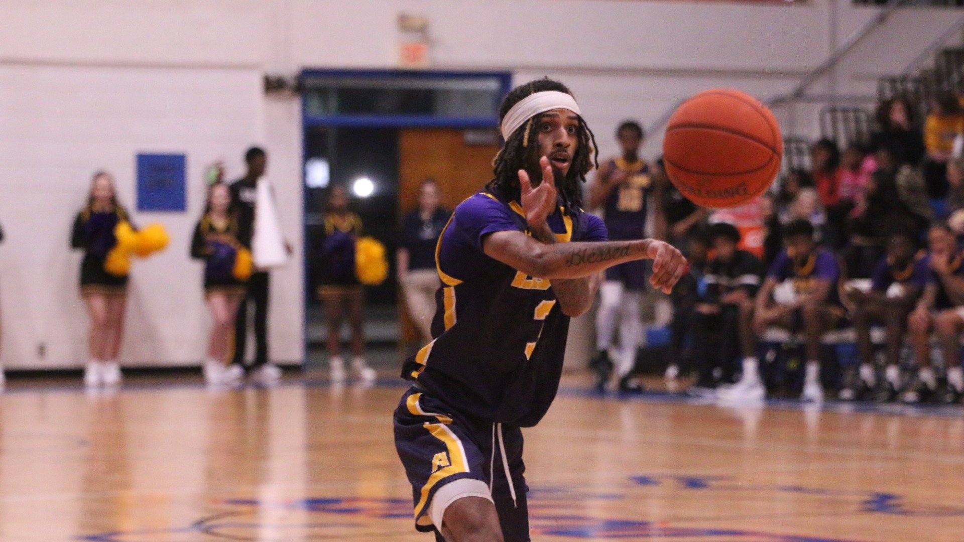 Layce Tolivar passes to a teammate during a game against LCU