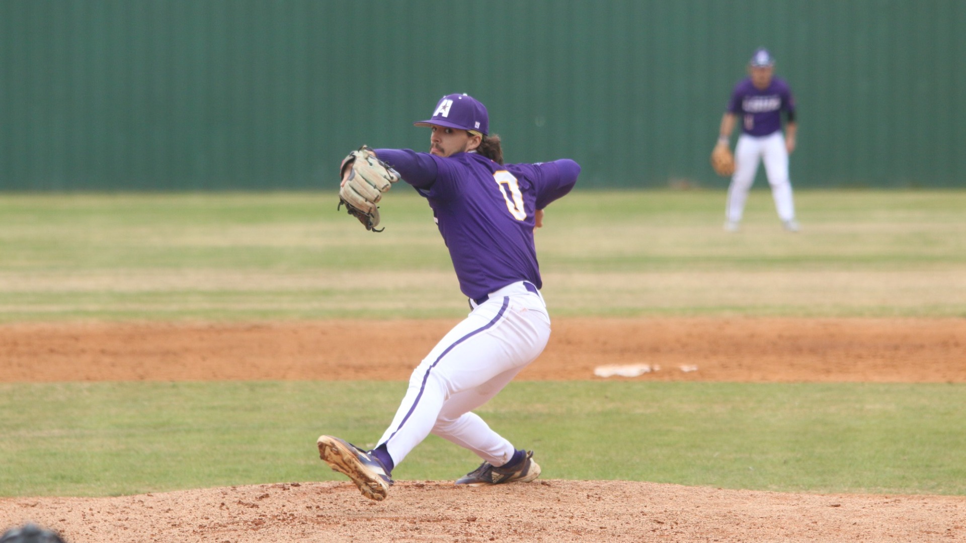 Colin Ardoin delivers a pitch against John Melvin University