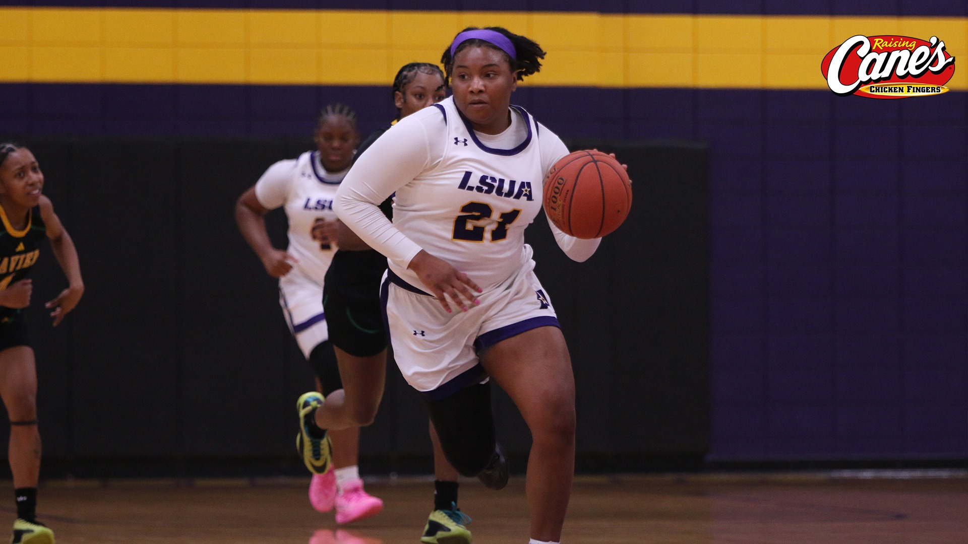 Princis Goff dribbles up court against Xavier (La.)