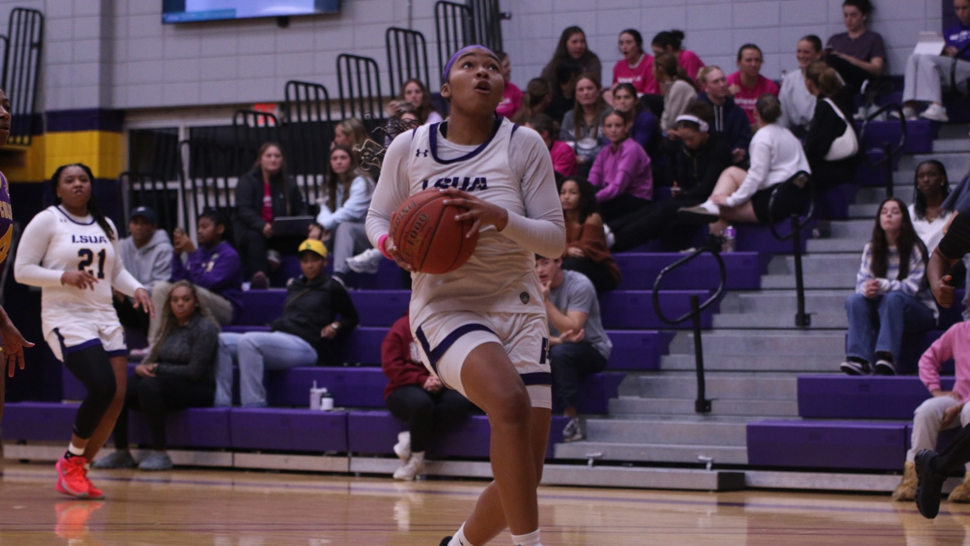 Sydney Person goes up for a layup against Texas College