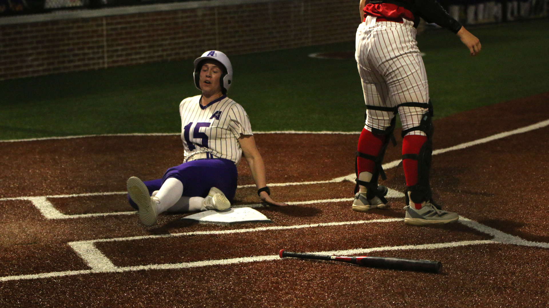 Kaetlyn Dunbar slides into home during a game against WCU