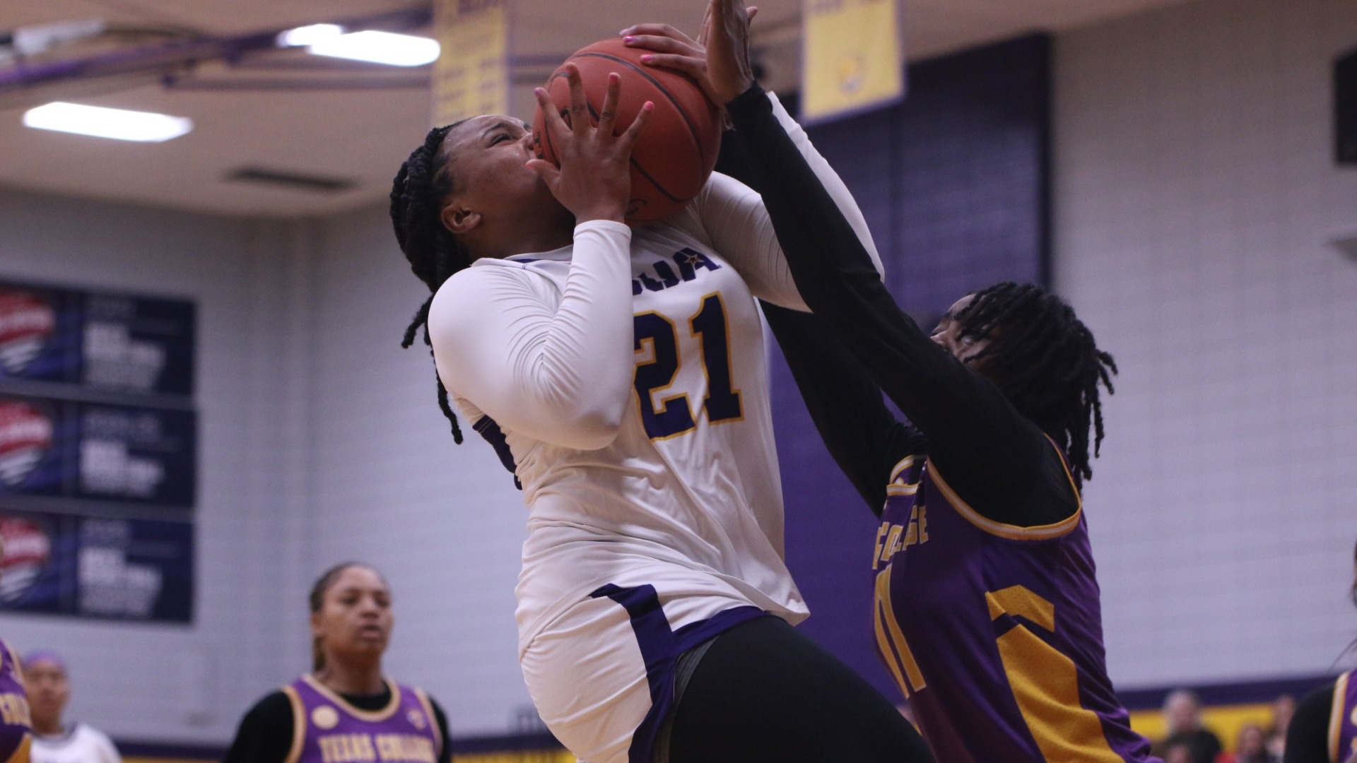 Princis Goff goes up for a layup against Texas College