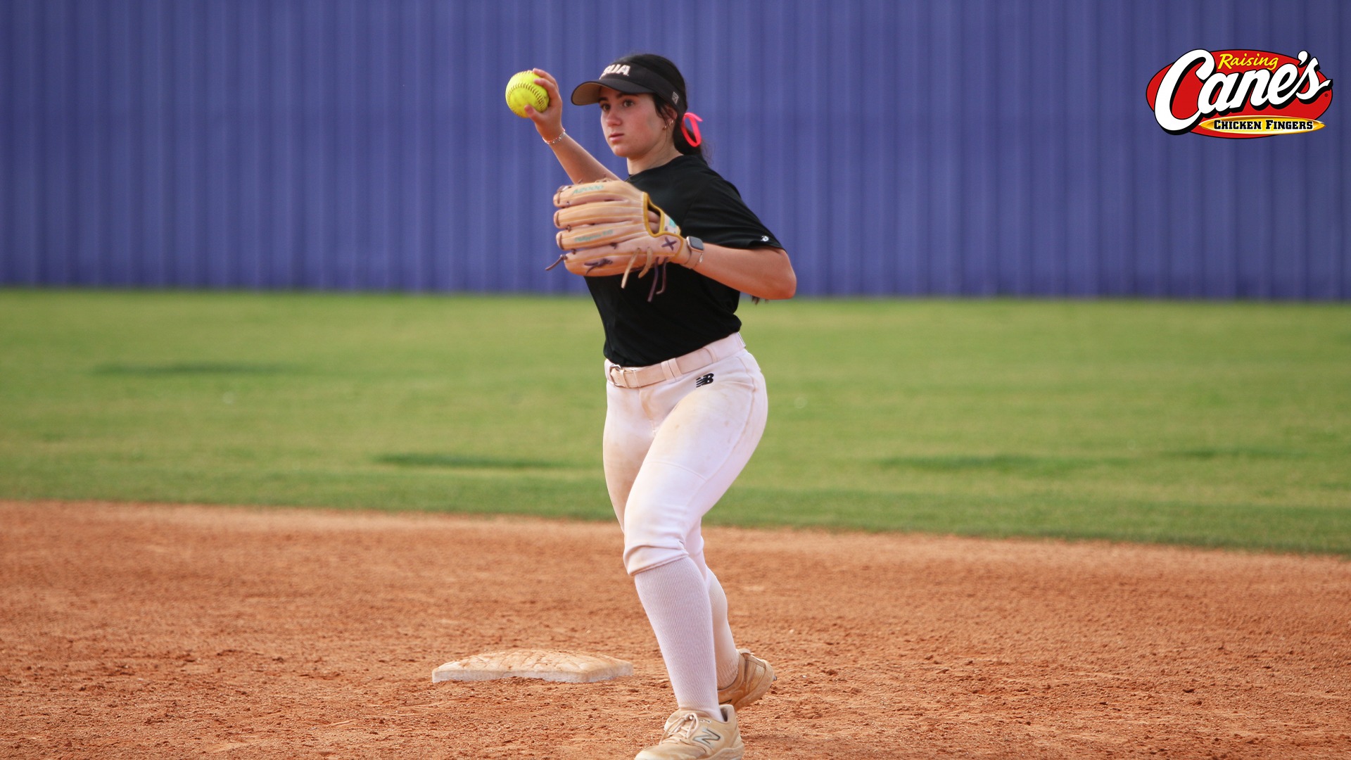 Jenna Chauvin throws after fielding a ground ball in practice
