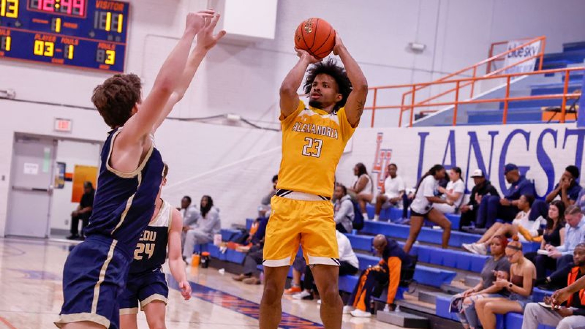 Jordan Decuir shoots over an Eastern Oregon defender during the NAIA First Round
