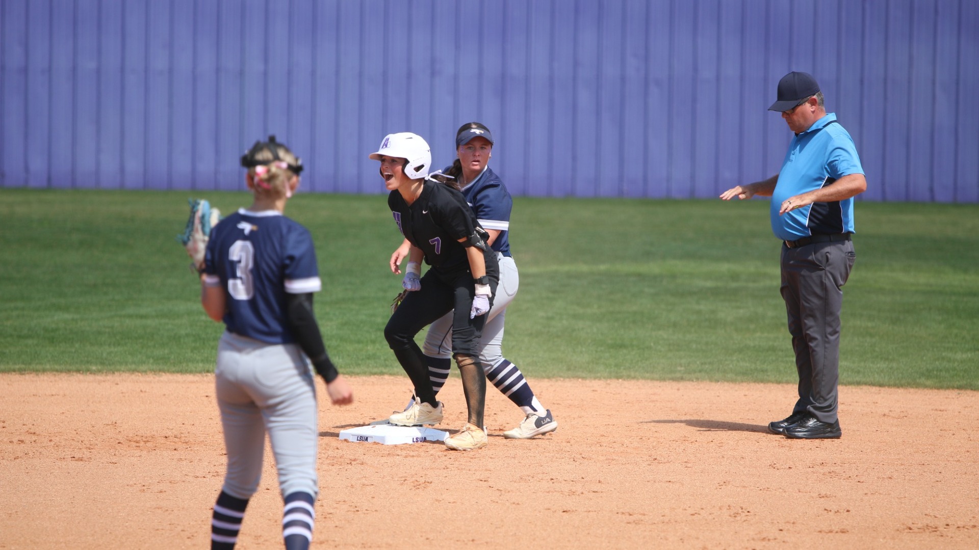 Livie Thibodeaux celebrates at second base after doubling against TAMUT