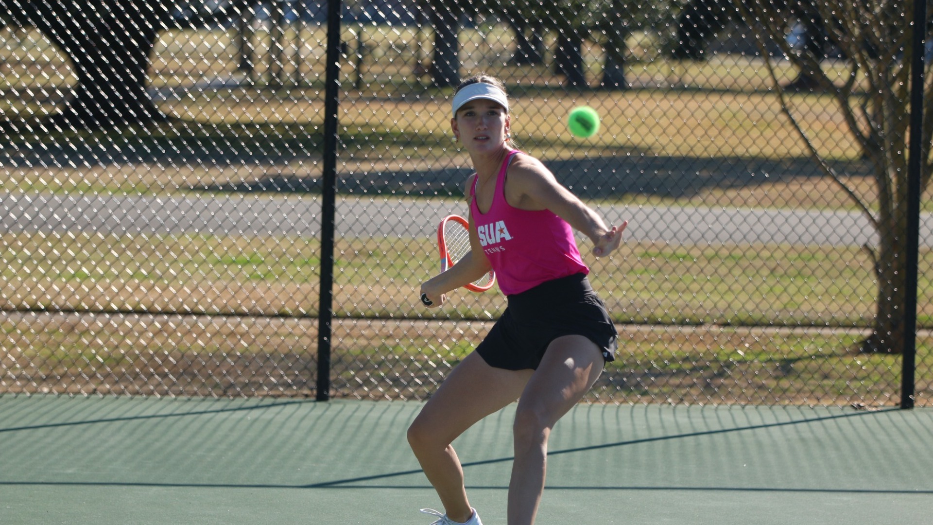 Joeline Roesch returns a ball during practice