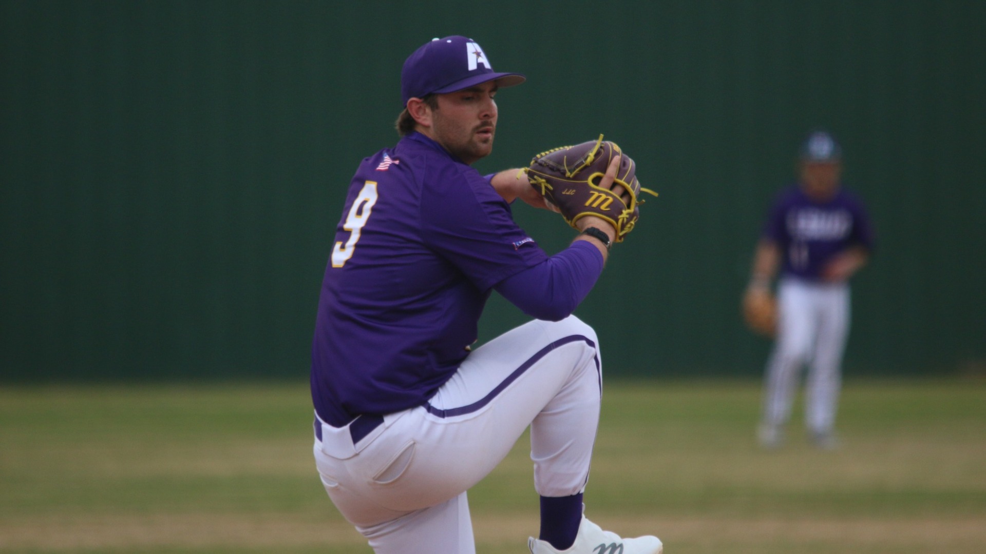 Michael Sutton delivers a pitch against John Melvin University