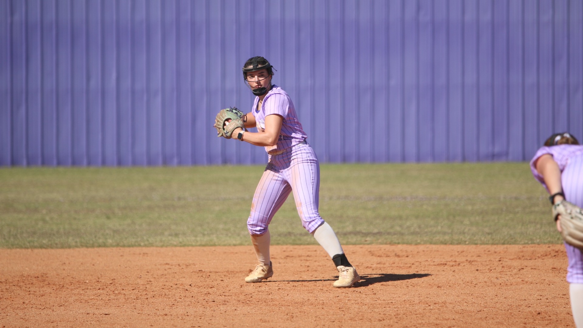Haley Fontenot prepares to throw across the infield