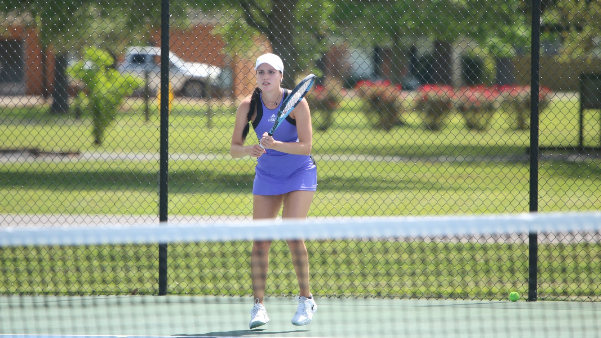 Ekaterina Orlova waits on a serve during a match