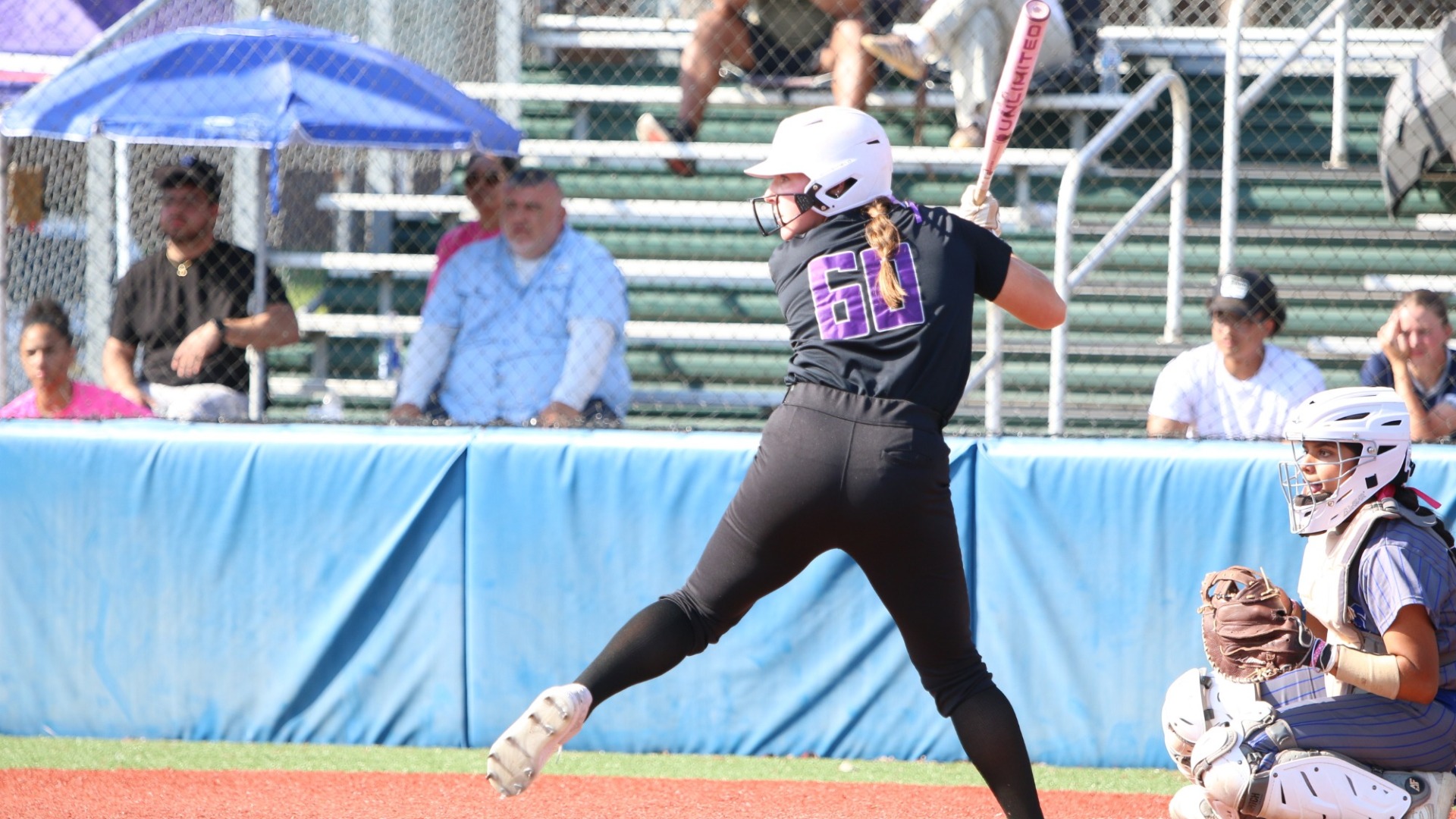 Kilee Moody strides during an at-bat 