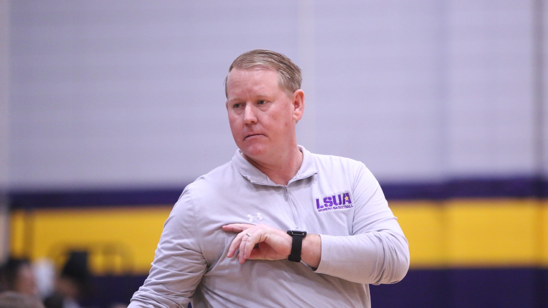 Billy Perkins directs his team during a game against LCU