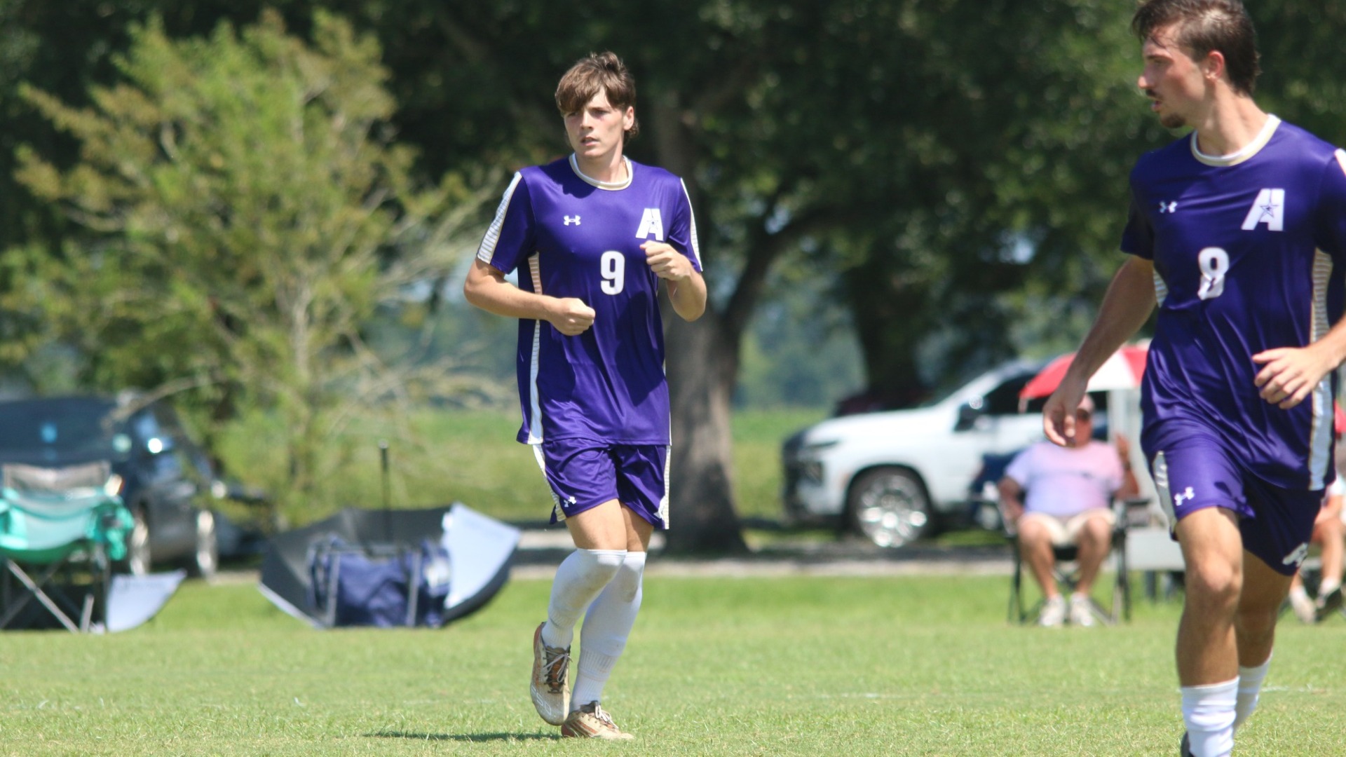 Ben McCarron jogs on the pitch during a game
