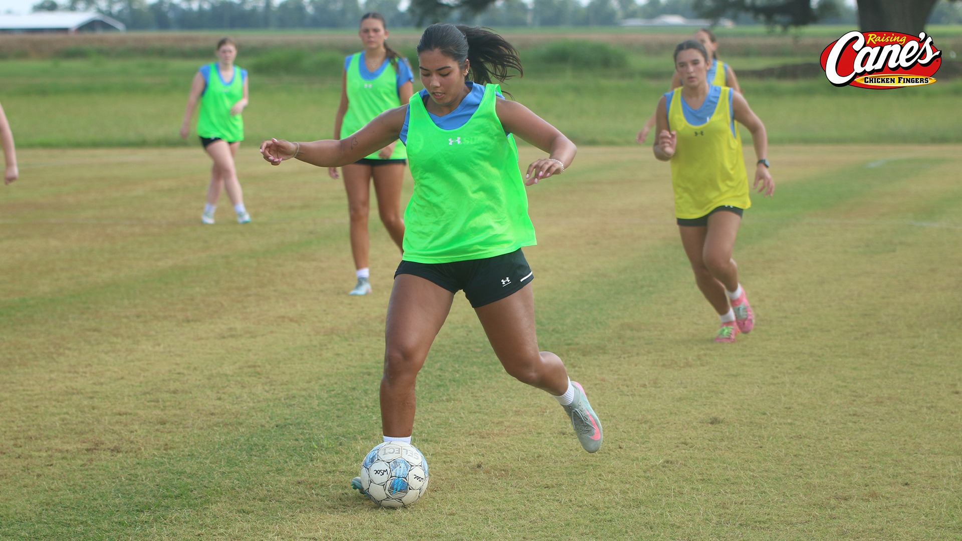 Hannah Holm Henriksen dribbles during a drill in practice