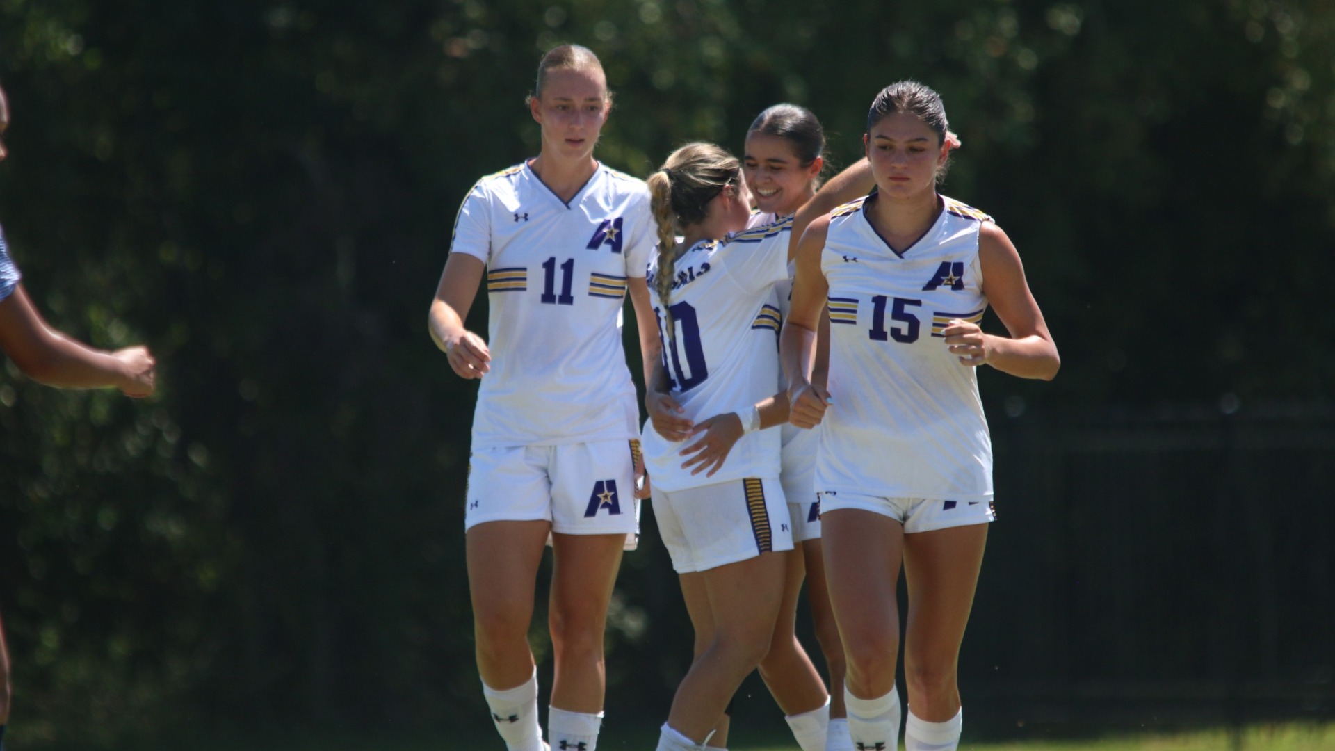 Sara Escribano hugs Abril Cobos after scoring