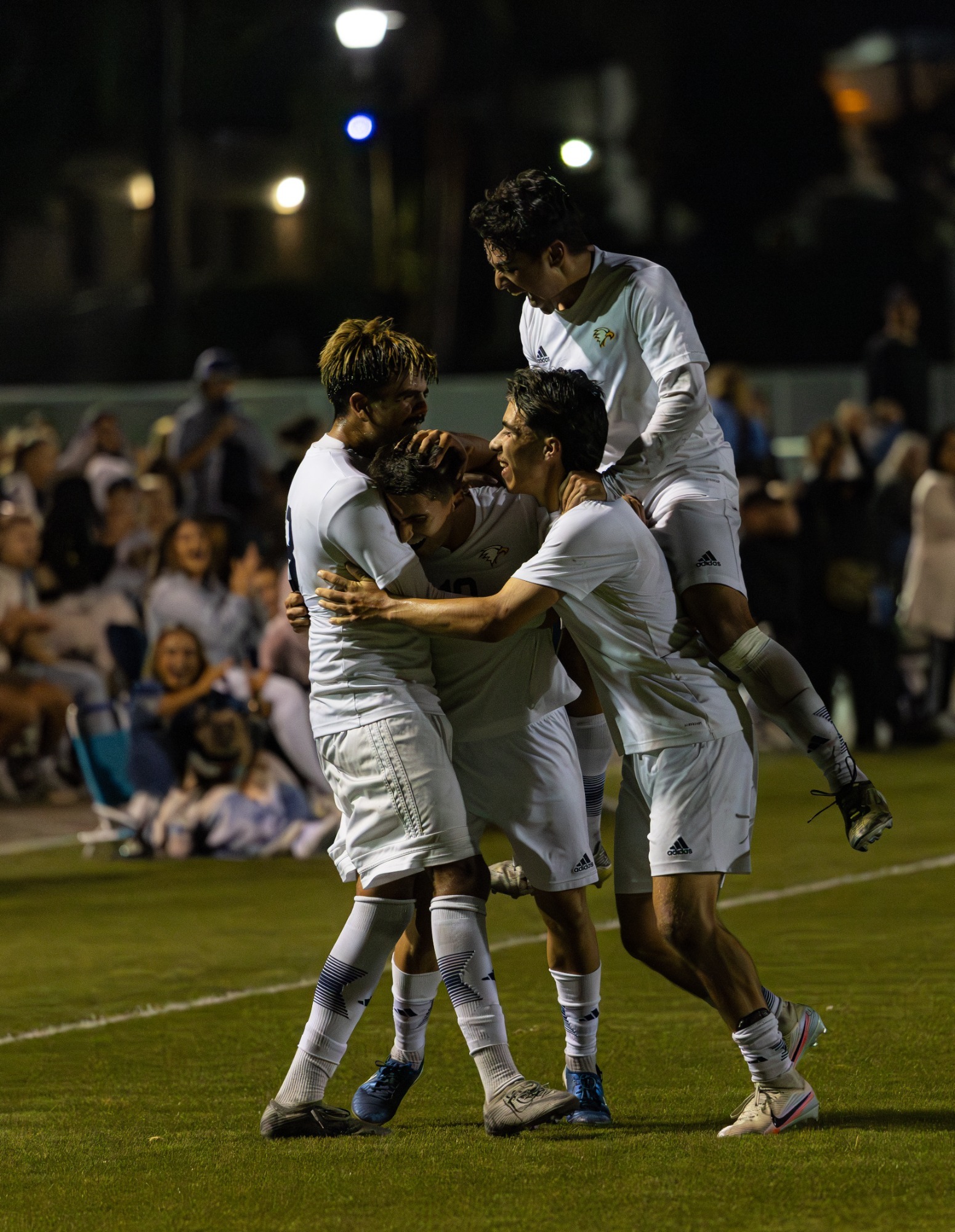 Men's soccer celebration