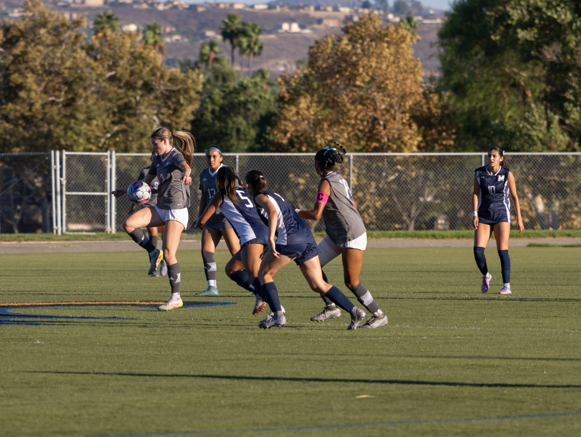 Tianna Breshears playing ball off her knee