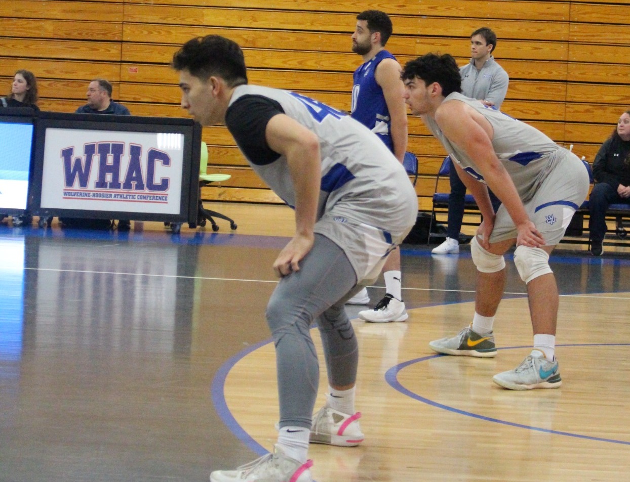 men's volleyball serve-receive action