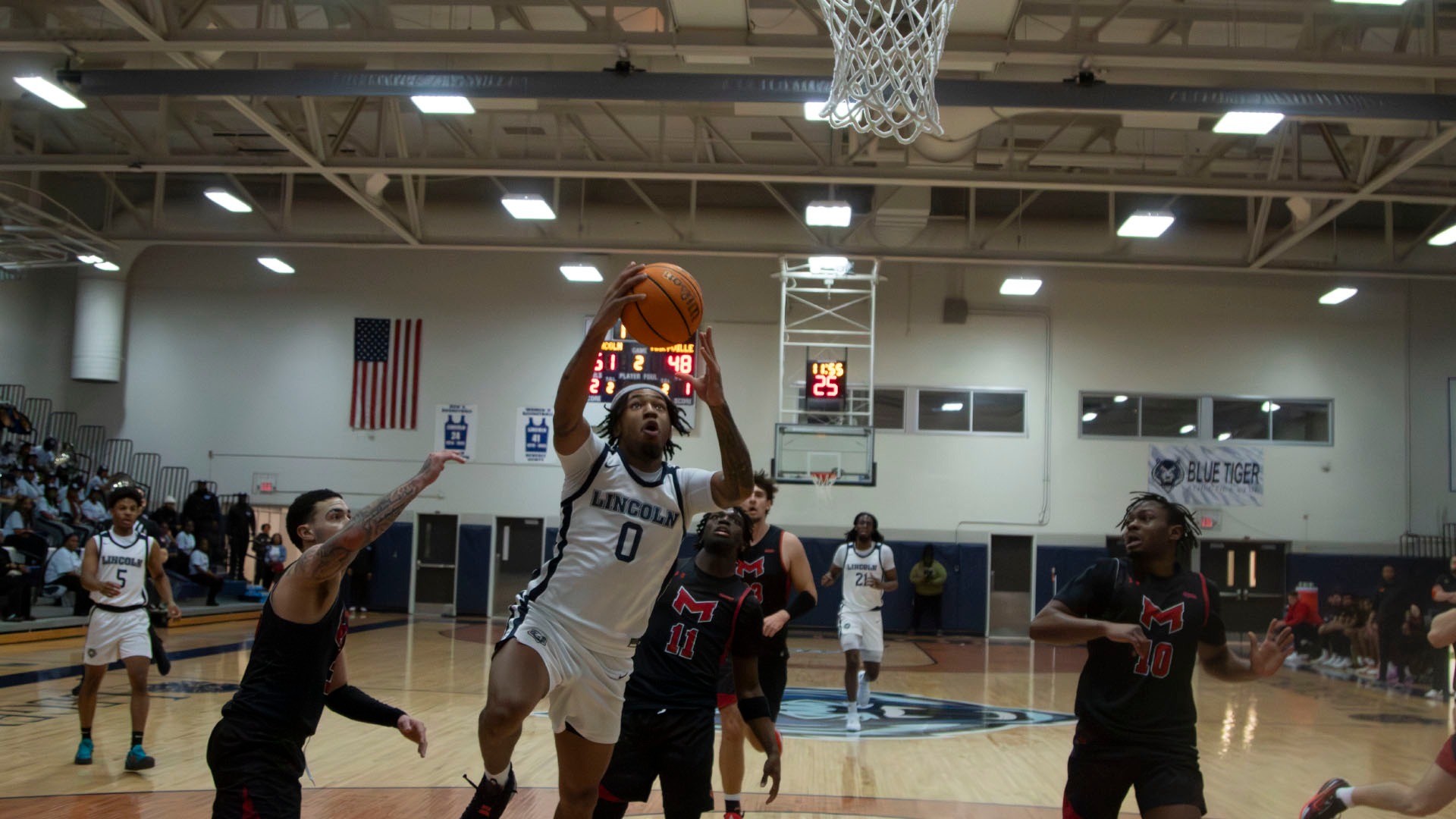 Solomon Oraegbu Drives for a Layup in a 21-point Performance Against Maryville