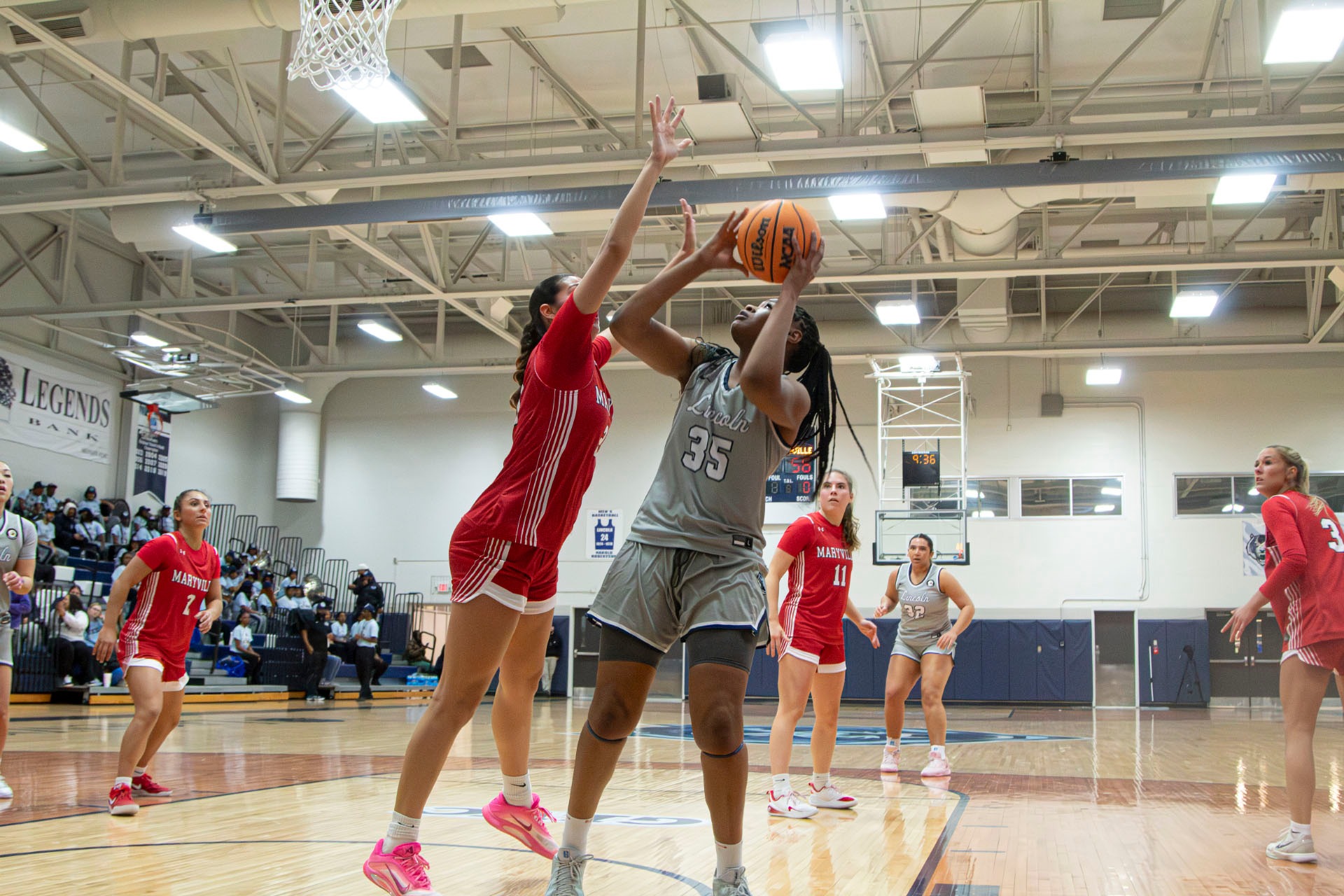 Aaliyah Smith Attempts a Shot Against Maryville