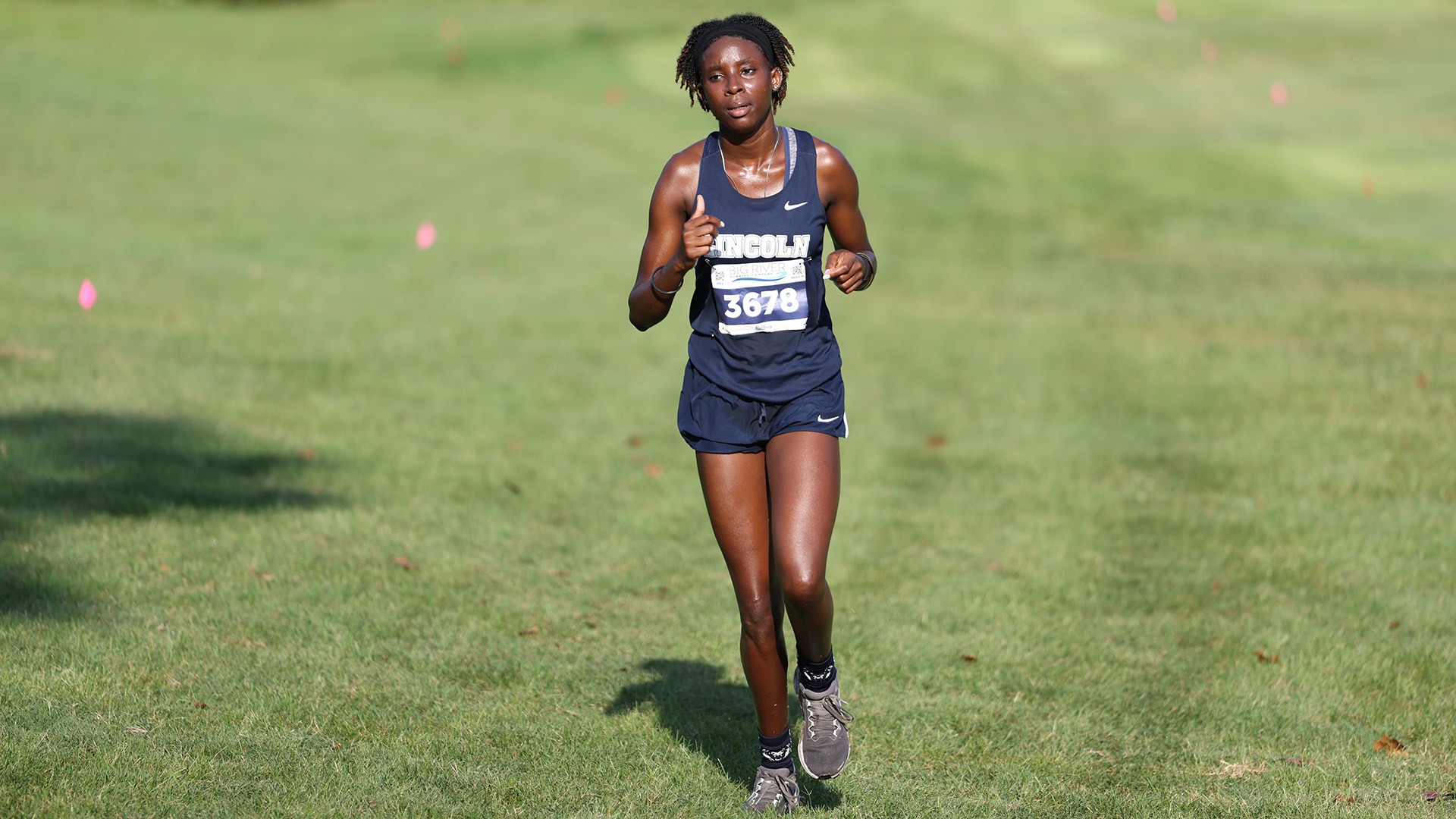 Hannah Charles runs in a cross country race in the Fall of 2026