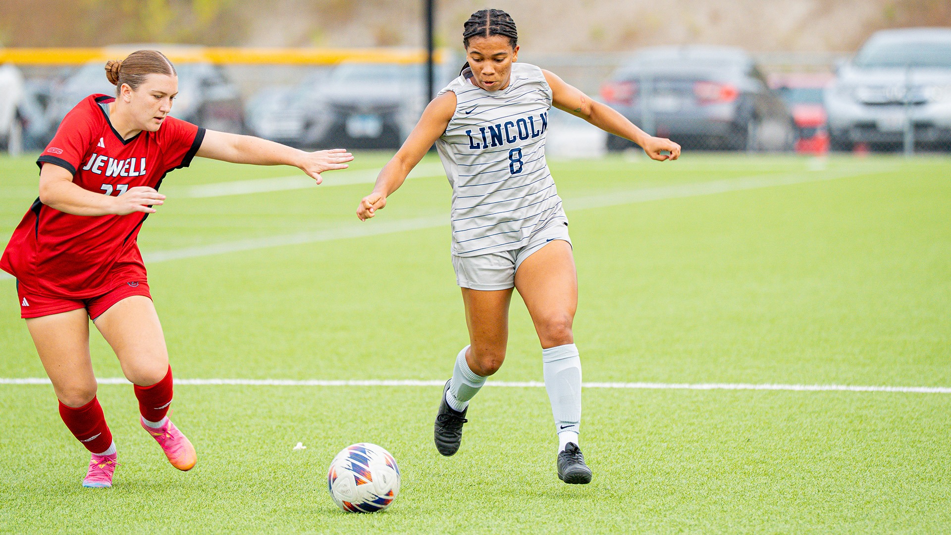 Dana Brooks dribbles past a William Jewell defender.