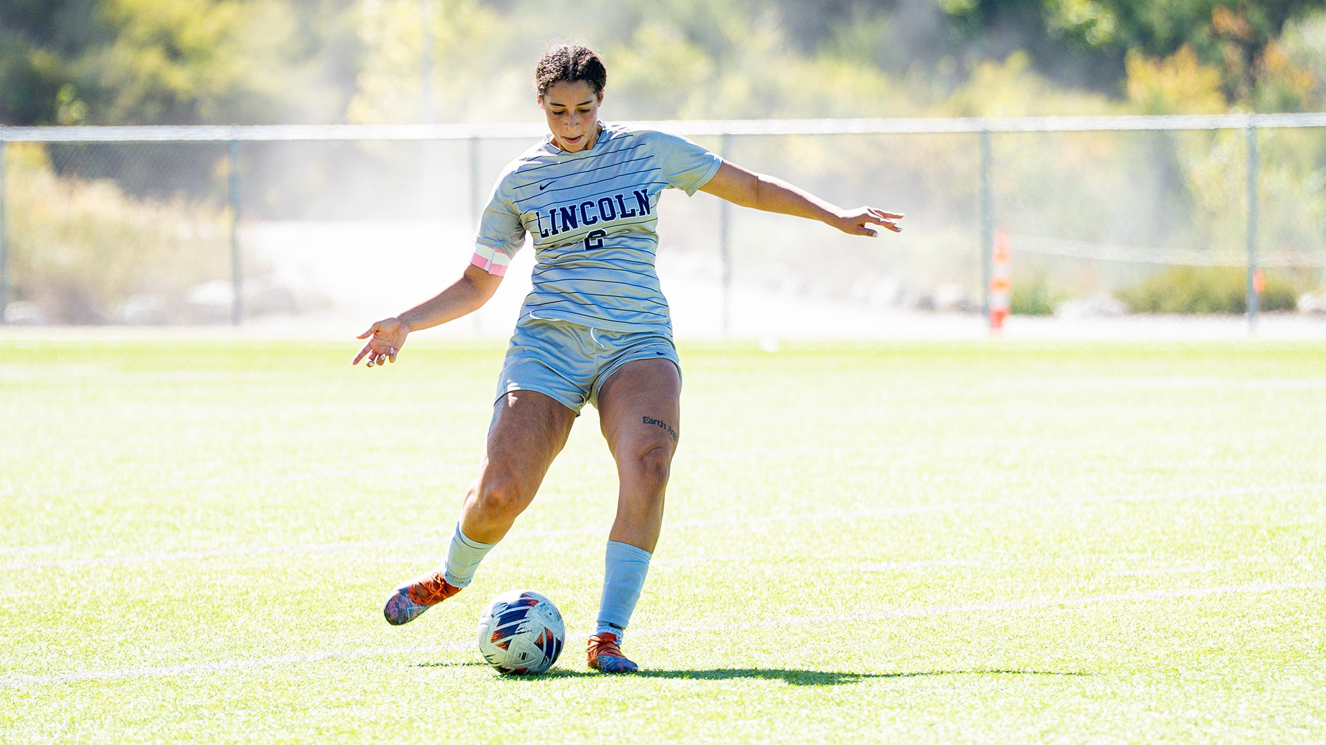 Adia Able plays the ball in a 2026 match against Lewis.
