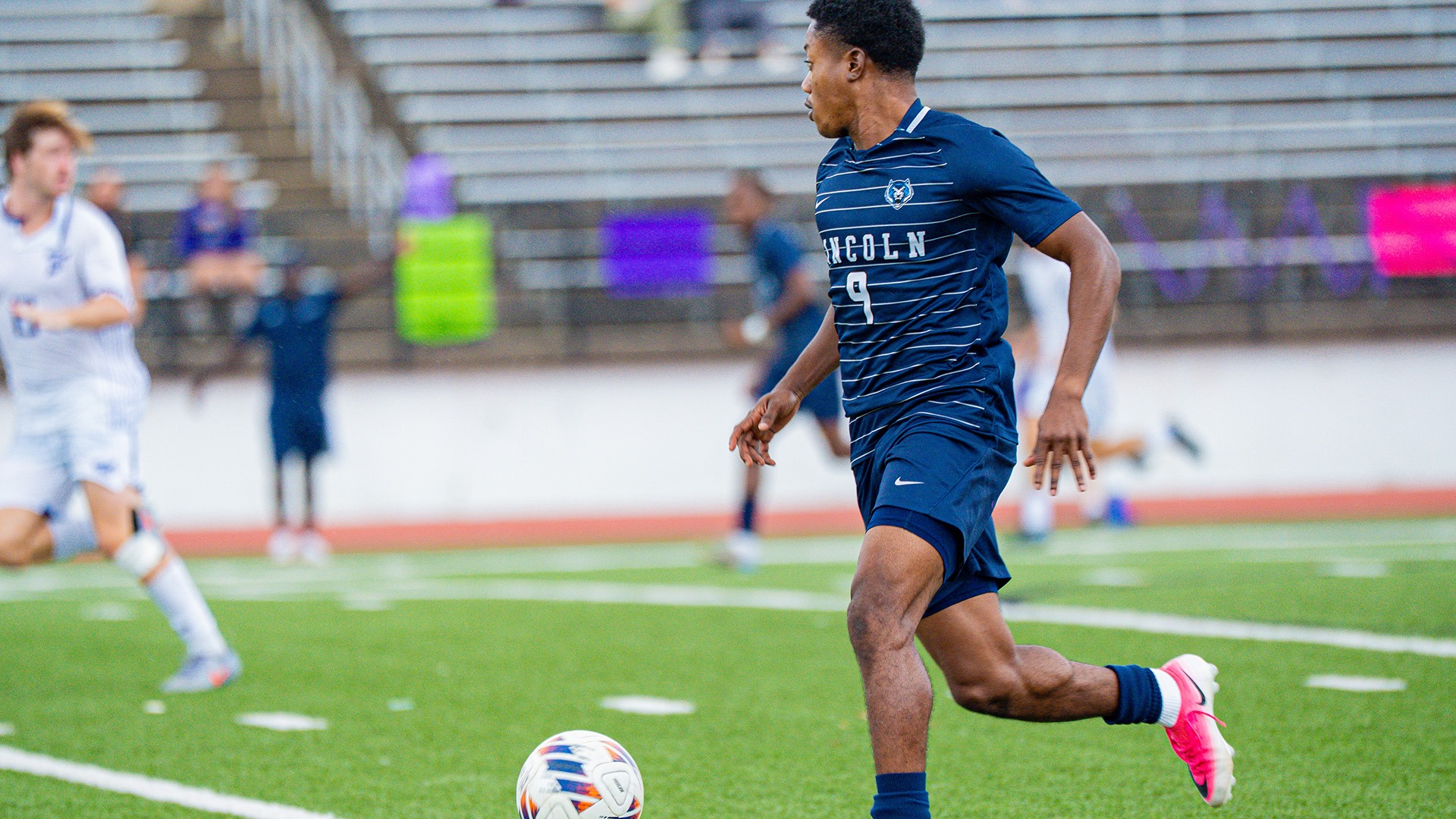 Ackeem Mullings Dribbles Down the Field in a Road Match at Truman State
