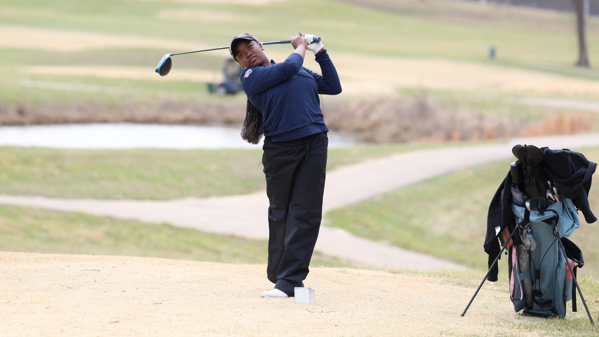 Seannae Norville-Smith Swings her Club at the CMU Invitational