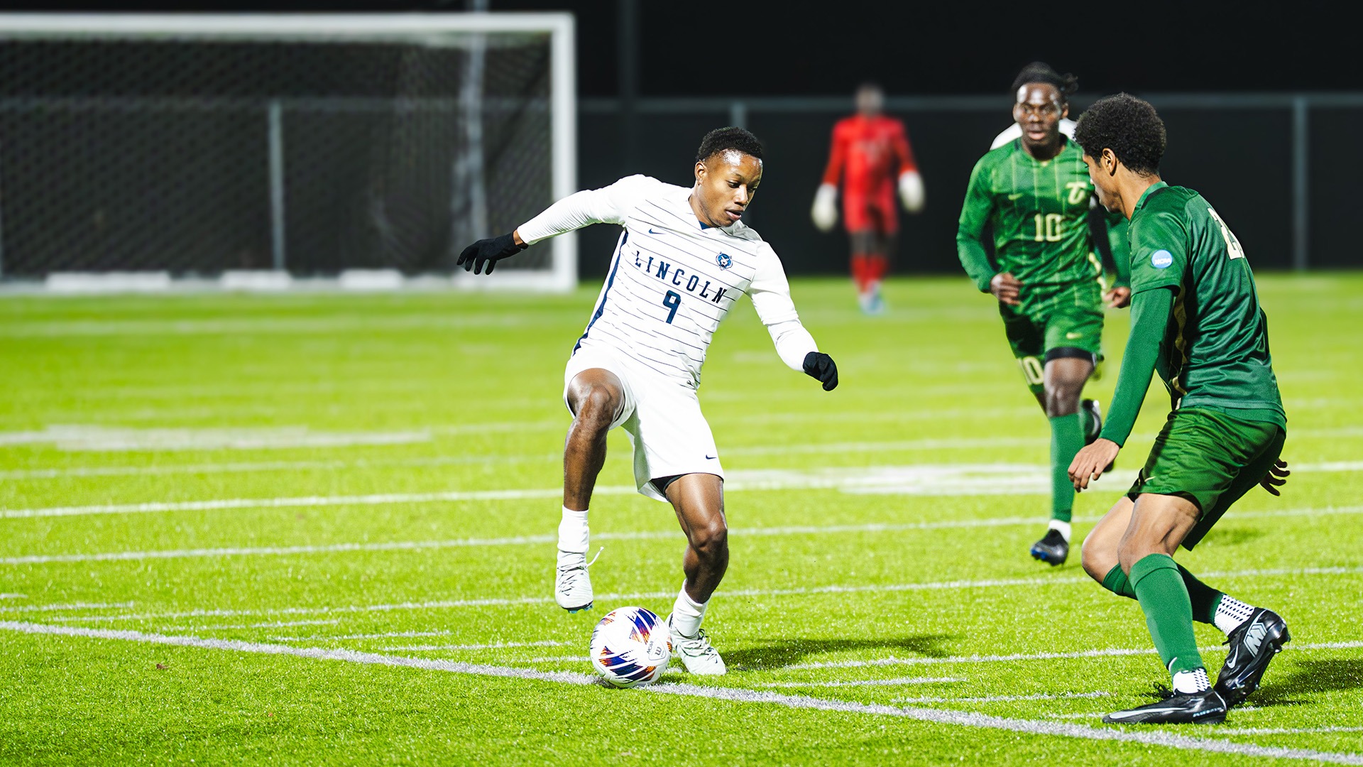 Ackeem Mullings controls the ball against a Tiffin defender in the NCAA Division II tournament in 2026