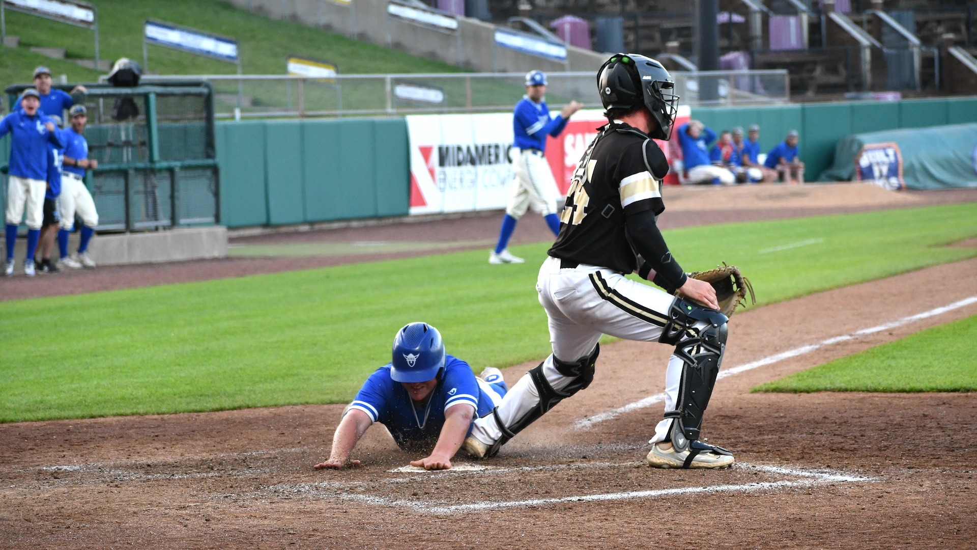 Noah Dutler Sliding into home
