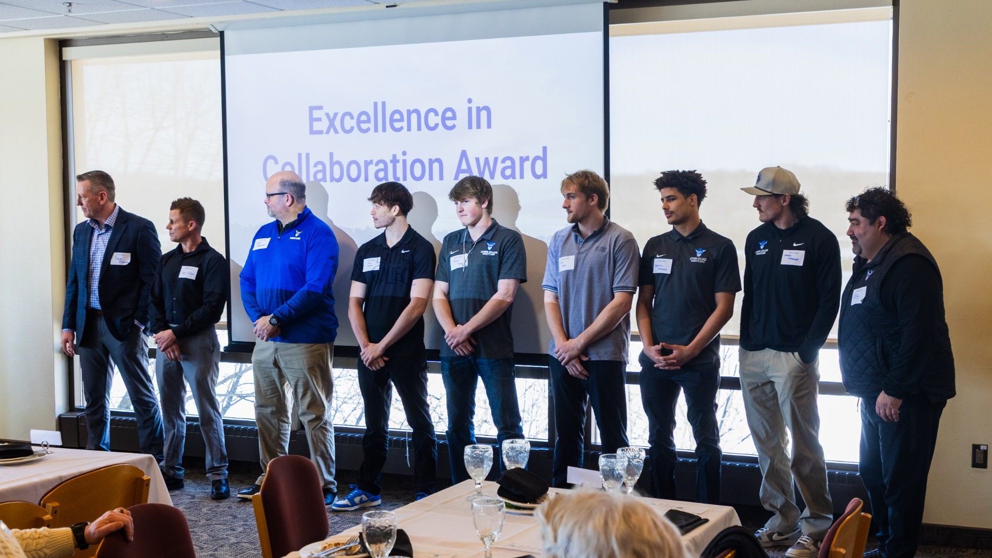 Luther Men's Wrestling Receiving Community Engagement Award Jan. 26 2026 